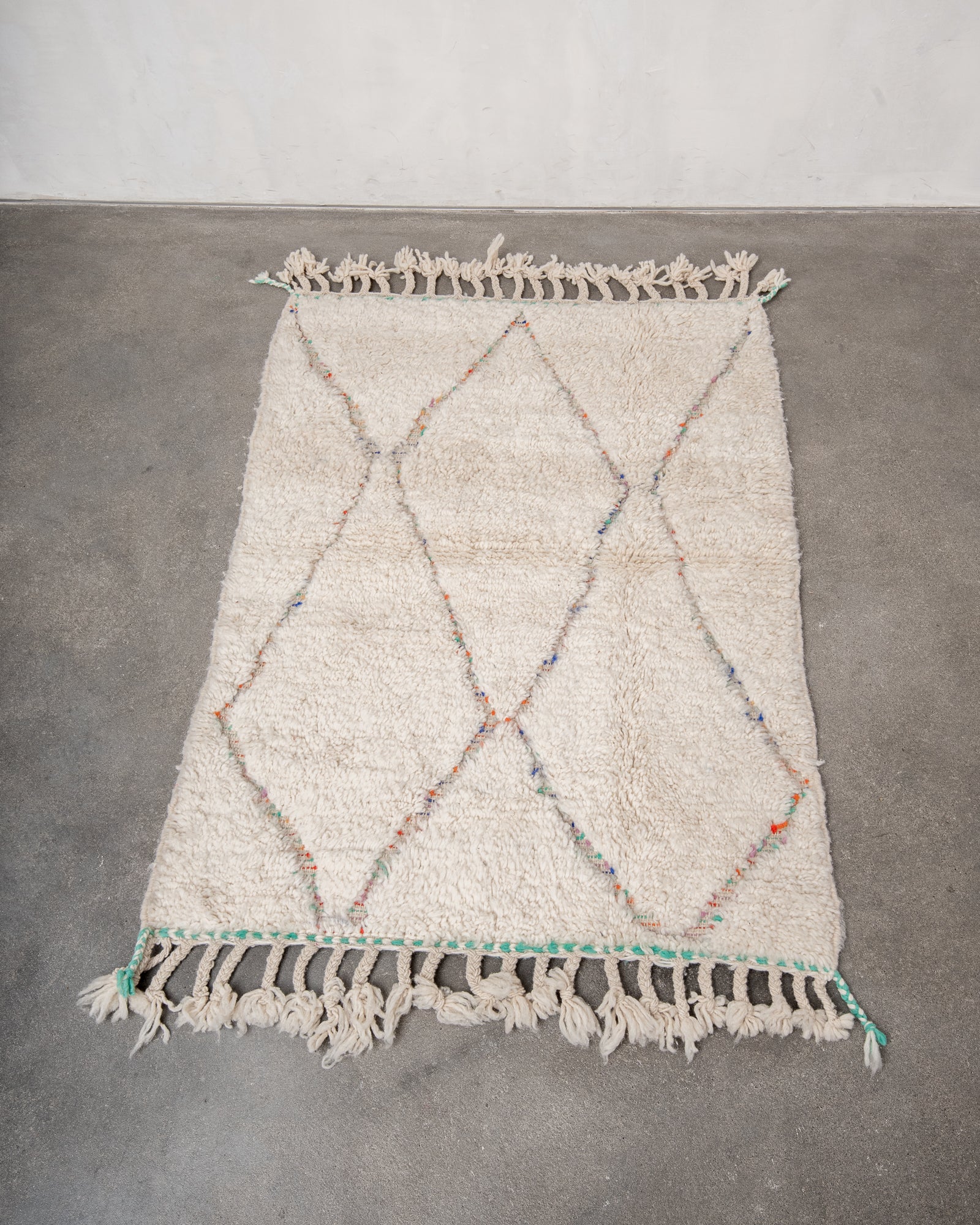 Modern, designer, handcrafted Berber rug from Morocco. Beniourain carpet with beautiful colours and patterns and fluffy wool texture.